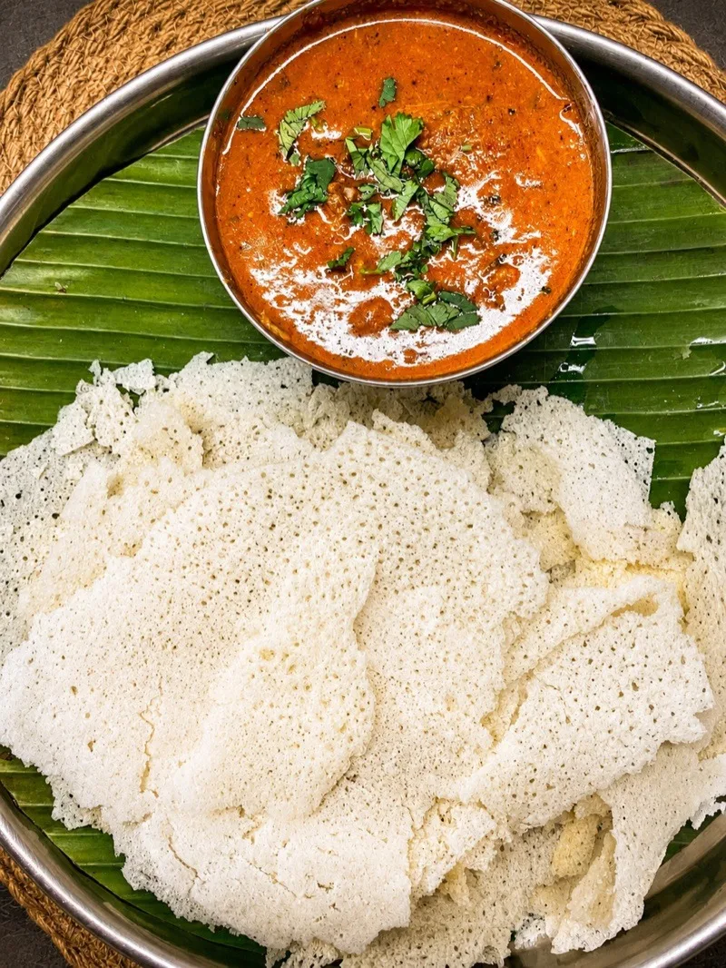 Kori Rotti at HeritageOne — Mangalorean chicken curry served with crisp wafer rice rotti